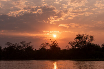 Beautiful sunset clouds and landscape by Pixaim River, Pantanal