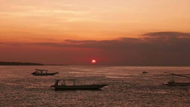 Bali, Nusa Penida Ocean Beautiful  drone shot, Sunset with boats.
