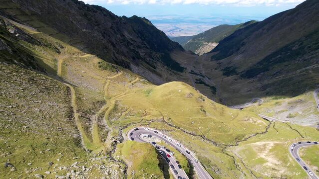 Aerial pedestal tilt down at u bend in Transfagarasan Serpentine Road romania