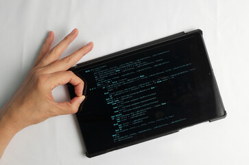 Programming and coding concept. Code generation: Fingers click to insert a new line in the code