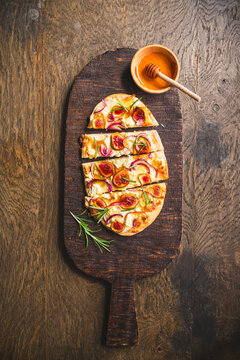 French Tarte Flambee (Flammkuchen) with figs, red onions, soft goat cheese and honey