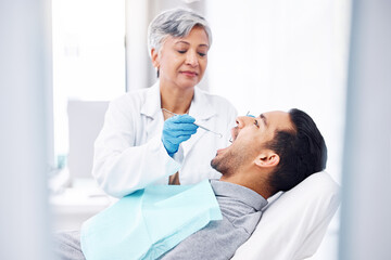 Woman, dentist and check teeth of man with tools for dental cosmetics, healthcare assessment and...