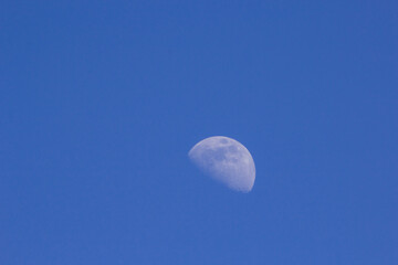 the moon in the daytime sky