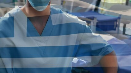 Animation of greece flag against portrait of biracial female surgeon in surgical mask at hospital - Powered by Adobe