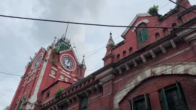 Low angle shot of historic tower of Hogg Market or Hogg Shaheber Bajaar popularly known as New Market in Kolkata, India.