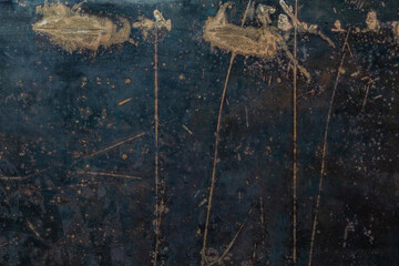 rusted black flat raw steel sheet surface texture and background with scratches.