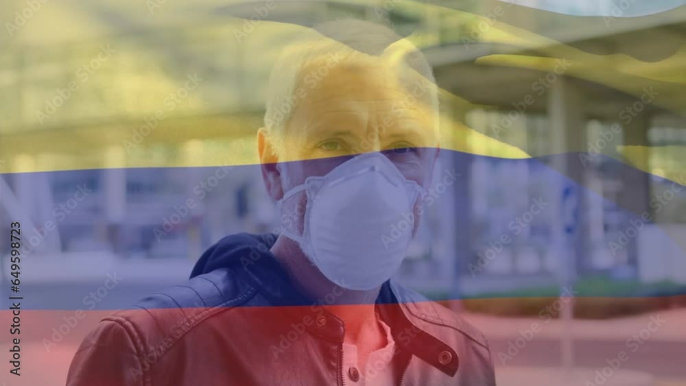 Poster Animation of waving colombia flag over portrait of caucasian man wearing face mask on the street