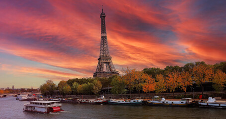 Fototapeta na wymiar Banner of travel in Paris with Eiffel Tower iconic Paris landmark across the River Seine with tourist boat in Autumn tree fall scene at Paris ,France