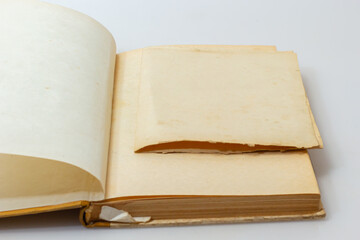 Open old book with blank pages and free space for text. The concept of reading literature, education and book publishing