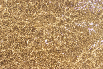 texture of sand and water close-up, there is space for an inscription