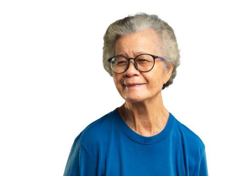 Beautiful senior woman looking at the camera with a smile while standing against a transparent background. - Powered by Adobe