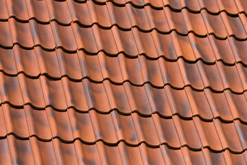 Red tiles roof background