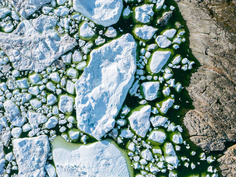 Greenland Ilulissat Icefjord Aerial View. Iceberg and glacier ice in Arctic nature landscape in Greenland. Ilulissat, Disko Bay, Baffin Sea, Greenland.