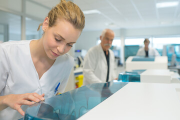 young woman technician in a scientific laboratory