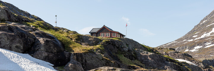 Traditional wooden house in the mountains of Norway. Panorama