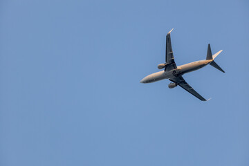 Silhouette and blue sky of an airplane