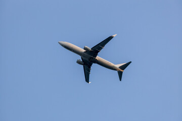 Silhouette and blue sky of an airplane