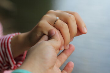 Hands of the groom and the bride, happy moments, romantic, engagement ring