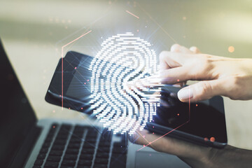 Multi exposure of abstract fingerprint scan interface and hand working with a digital tablet on background, digital access concept