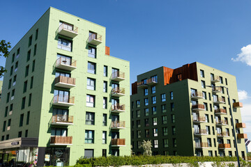 Modern apartment buildings exteriors in sunny day. High quality photo