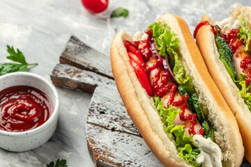 Hotdog with sausage and fresh salad, The fast food menu