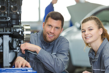portrait of professional and teenager in apprenticeship