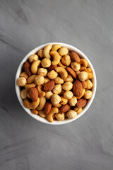 Roasted Assorted Nut Mix with Cashews, Almonds and Hazelnuts in a Bowl, top view. Flat lay, overhead, from above.