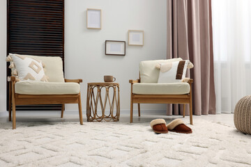 Obraz premium Stylish living room with soft white carpet and furniture. Interior design