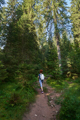 Fototapeta premium Woman hiker on a trail