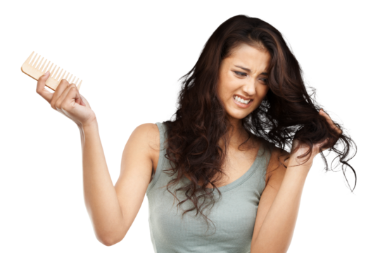 Comb, frustration and young woman with frizz, ugly and curly hairstyle for salon treatment. Upset, beauty and upset female model with messy hair from stress isolated by a transparent png background.