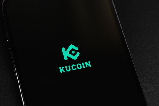 KuCoin logo mobile app on a screen smartphone closeup. KuCoin - one of the largest cryptocurrency exchange on the market. Batumi, Georgia - August 17, 2023