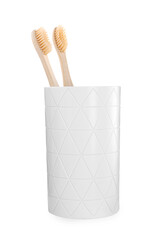 Fototapeta na wymiar Bamboo toothbrushes in holder isolated on white
