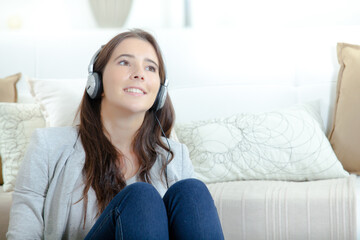 Young brunette listening to music