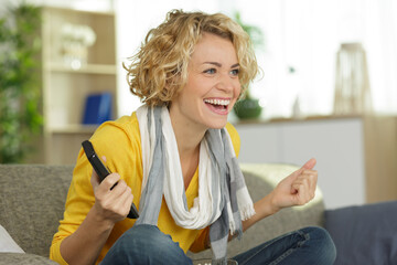 excited woman winning online prize
