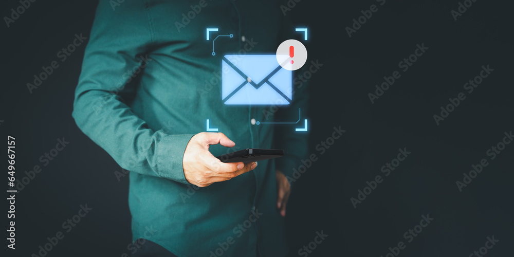 Poster male hand using a mobile phone with an email icon, email alert with a caution warning sign for notif