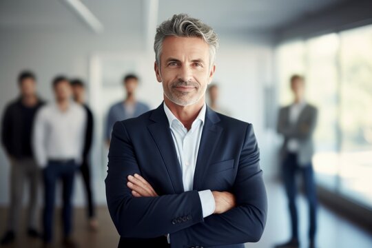 happy smiling mature businessman ceo company manager standing in office at meeting