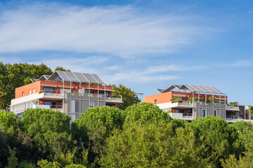 Landscape view of contemporary apartment buildings with solar panels in modern Port Marianne neighbourhood, Montpellier, France