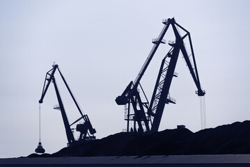 Fototapeta na wymiar MARITIME TRANSPORT - Port crane at the coal terminal 