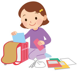 時間割を合わせる女の子　小学生