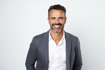 Portrait of a confident Israeli man in his 40s wearing a chic cardigan against a white background