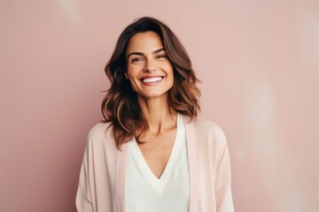 Fototapeta premium medium shot portrait of a Israeli woman in her 30s wearing a chic cardigan against a pastel or soft colors background
