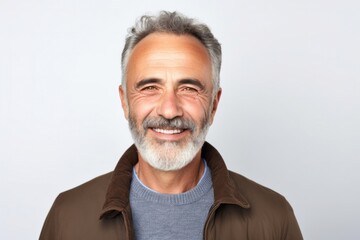Obraz premium medium shot portrait of a Israeli man in his 50s wearing a chic cardigan against a white background