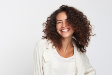 Obraz premium medium shot portrait of a happy Mexican woman in her 30s wearing a chic cardigan against a white background