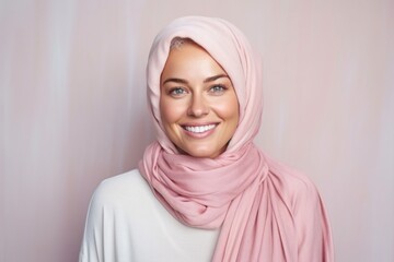 medium shot portrait of a happy Polish woman in her 30s wearing a charming scarf against a pastel or soft colors background