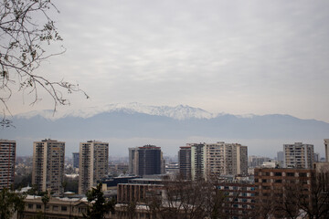 View of residential and business buildings with the Andes Mountains in the background of the tourist center of Santiago de Chile