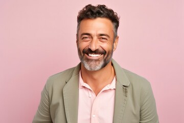 Obraz premium medium shot portrait of a Israeli man in his 40s wearing a chic cardigan against a pastel or soft colors background