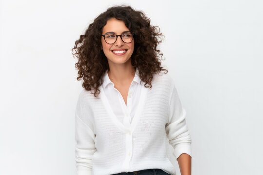 medium shot portrait of a Israeli woman in her 30s wearing a chic cardigan against a white background