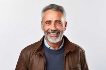 Fototapeta premium medium shot portrait of a confident Israeli man in his 50s wearing a chic cardigan against a white background
