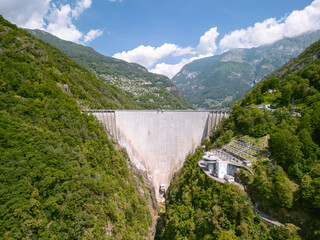 Obraz na płótnie Canvas a large dam in Switzerland that holds back huge amounts of water and also generates electricity