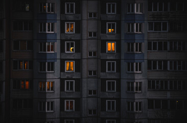 A soviet building in the city in evening in winter